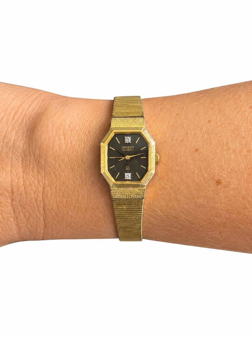 Vintage Delicate Orient Quartz Women's Gold Tone Watch with Black Dial